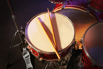 Fototapeta na wymiar Drums set and sticks, close-up