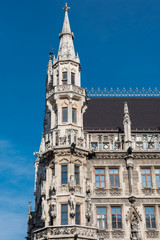 Fototapeta premium Munich town hall detail in the sun against blue sky
