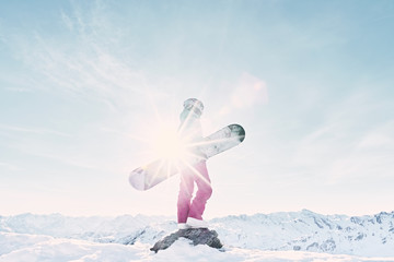 Young woman with snowboard