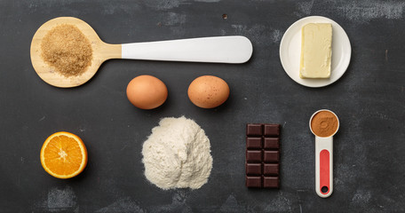 Top view of food ingredient on dark chalkboard with copy space for recipe