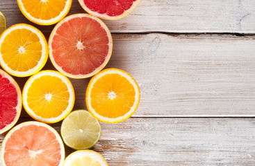 Slices of various citrus fruits