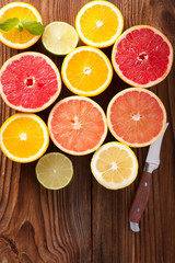 Fototapeta na wymiar Slices of various citrus fruits