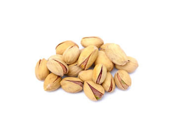 Pile of fresh pistachios isolated on white background