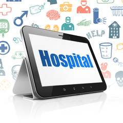 Medicine concept: Tablet Computer with Hospital on display