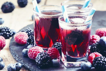 Ice berry tea with raspberries, blackberries and blueberries, se