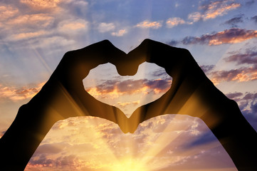 Silhouette of the heart hand gesture