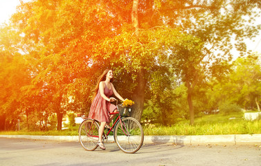 Young woman and bike