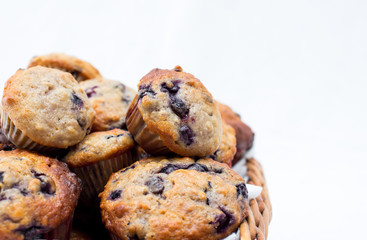 blueberries muffins on a white background 