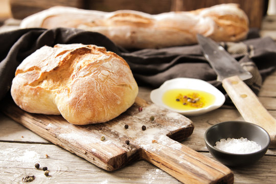 Fresh bread with salt and a delicious olive oil