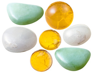 various opal gem stones isolated on white