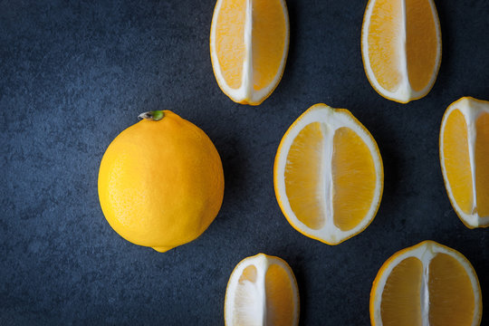 Yellow Lemons On A Blue Stone Table