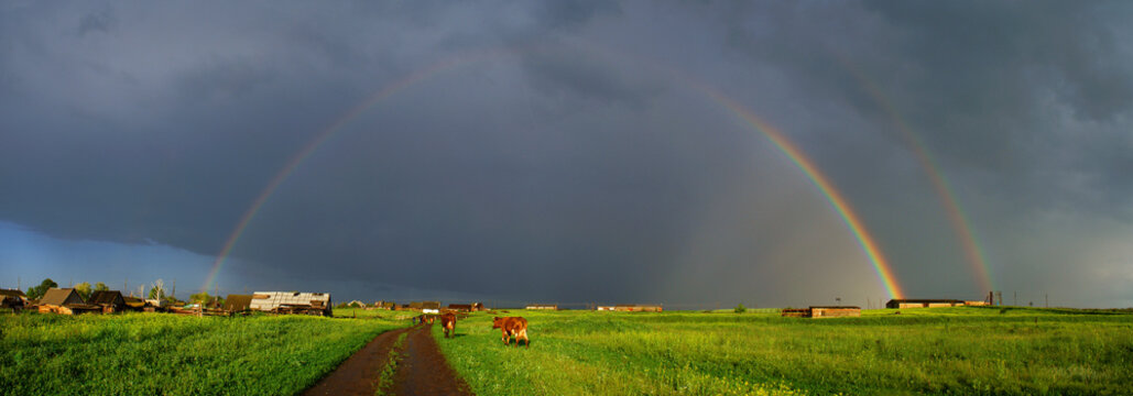 Rainbow over road