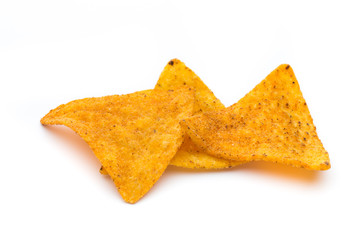 Mexican nachos chips, isolated on white background. © gitusik