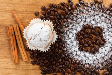 Coffee cupcake, coffee beans overhead view