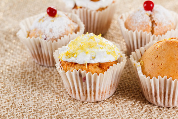 Muffins with cranberries and lemon zest, closeup
