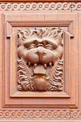 Vintage wooden bas-relief of a lion
