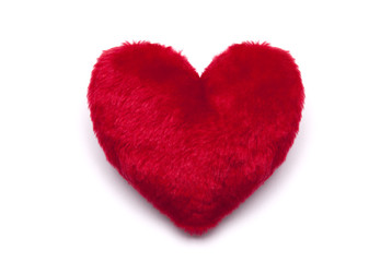 Plush red heart on white background