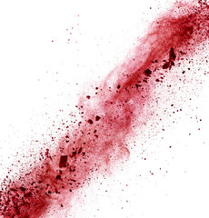 Explosion of red powder on white background