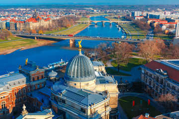 Aerial view over river Elbe, bridges and glass dome of Academy of Fine Arts or Lemon Squeezer,...