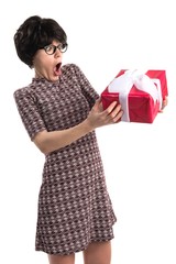 Brunette girl holding a gift