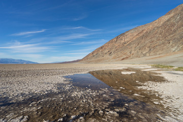 Fototapeta na wymiar Reflection in the water of Badwater Basin