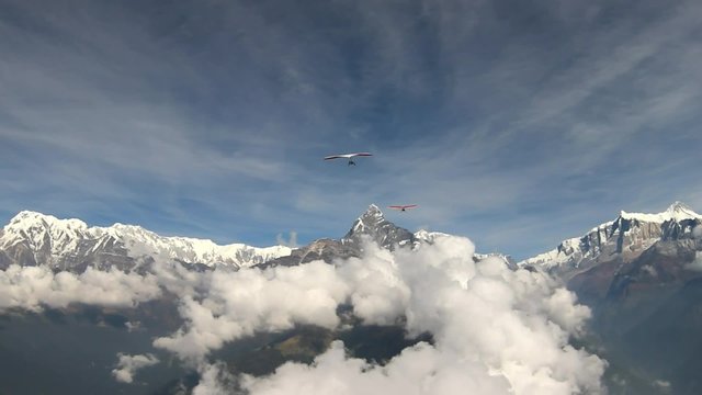 Aerotowing towards the Annapurna on a tandem hang-glider