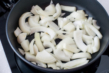 Onion fried in a pan