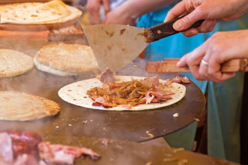 Preparation of pita bread with meat