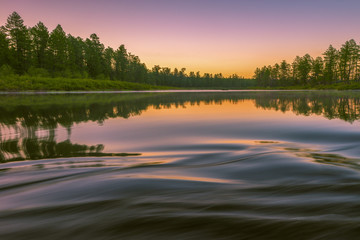 Summer landscape with river, forest and sky 