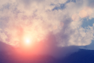 Obraz premium Mountains against the evening sky and setting sun