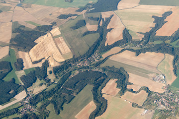 The land with meadows, forests, settlement view from above