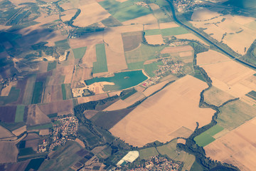 The land with meadows, forests, settlement view from above