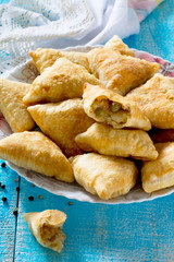 The Indian national dish of samosas, fried cakes with vegetables