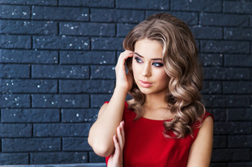 Portrait a beautiful woman in red dress