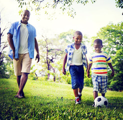 Obraz premium African Family Happiness Holiday Vacation Activity Concept