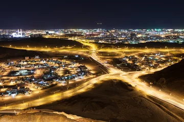 Zelfklevend Fotobehang View of Muscat at night © philipus