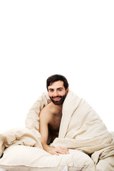 Obraz premium Man waking up in bed.