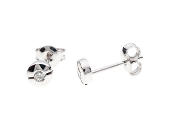 Couple of diamond earrings isolated