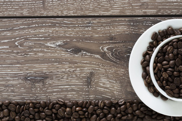 Fototapeta premium coffee beans in a cup