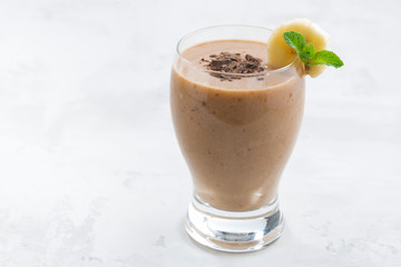 banana chocolate smoothie in a glass