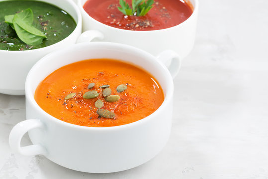assortment of colorful vegetable cream soup