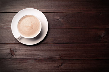 coffee cream cappuccino cup on wooden background morning breakfast