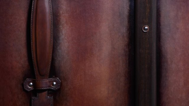 Trunk Maker at work in his luxury leather workshop