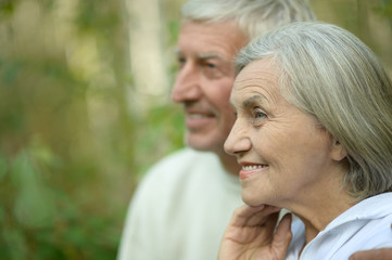mature couple   in summer park