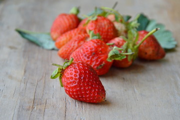 strawberry on wooden board