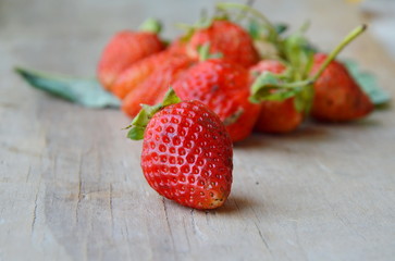 strawberry on wooden board