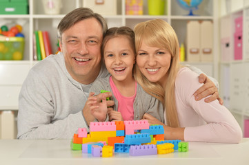 Obraz na płótnie Canvas happy family playing at home