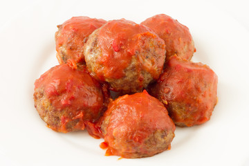 Meatballs  with tomato sauce on the white background