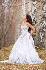 Fototapeta na wymiar Young Bride In A Forest