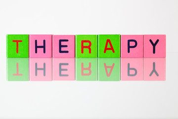 Therapy - an inscription from children's blocks
